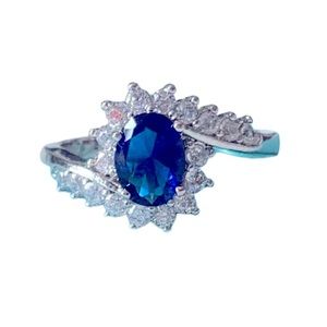 Blue and crystal ring
